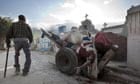 Bodies are piled up at the cemetery in Port-au-Prince, Haiti.