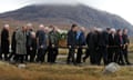 Mourners carry Linda Norgrove's coffin at her funeral on Lewis