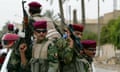 Members of the Wolf Brigade patrol Baghdad in 2005