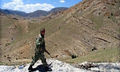 A Pakistani soldier patrols the border with Afghanistan in North Waziristan