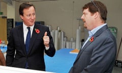 David Cameron talks to Oliver Bridgeman of Rocket Graphics Ltd, visit to Watford on 1 November 2010.