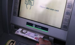 Cash being withdrawn from a bank ATM or cash machine