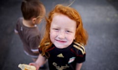 red haired girl eating bread children