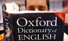 Man reading Oxford Dictionary of English