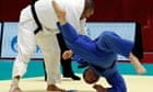 Japan's Hiroki Tachiyama against Uzbekistan's Abdllo Tangriev during the men's judo
