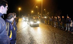 Michaela McAreavey's body is transported to Ballygawley, Co Tyrone, watched by mourners