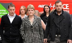 Ian Tomlinson's widow, Julia, arrives at the inquest with stepsons Richard King and Paul King