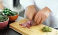 Chef chopping onions