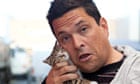 Dom Joly holding a kitten.