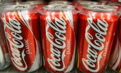 coca-cola cans on the shelf