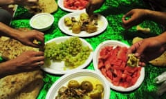 Interpreters at FOB Shawqat Nad-e-Ali Afghanistan, prepare their evening meal