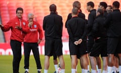 Fabio Capello talks to team