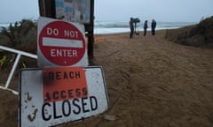 A TV crew take footage on Plum Island beach while Hurricane Sandy approaches New England in Newbury, Massachusetts.