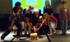 frank cottrell boyce and young critics cut cake