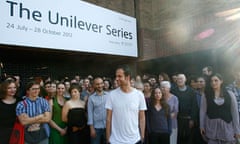 Tino Sehgal with exhibition participants outside the Tate Modern.