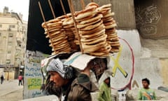 Man sells bread near the Interior Ministry in Cairo