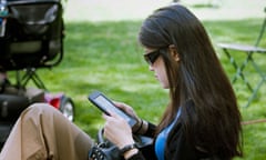 A reader uses her Nook ereader 