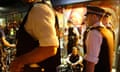 Police contain a group of protesting cyclists outside the London 2012 Olympics zone 