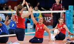 Martine Wright celebrates a point with Victoria Widdup in their Paralympics match against Ukraine