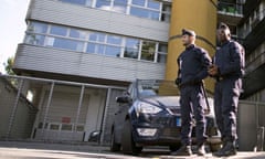 Policemen in front of offices of French magazine Charlie Hebdo