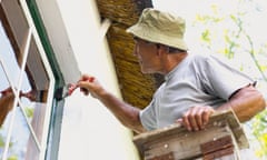 Man painting a house