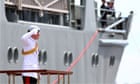 Prince Harry stands and salutes
Prince Harry stands and salutes 