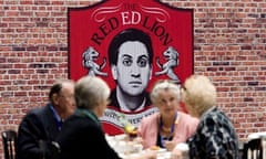 Tory delegates take afternoon tea near to a spoof Ed Miliband-themed "pub" at the Manchester confere