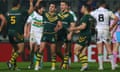 Jarryd Hayne (L) of Australia celebrates a try with Robbie Farah (2L) during the Rugby League World Cup Group A match against Ireland.