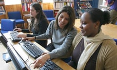 Mature female students in computer class at adult education centre FE Camden London