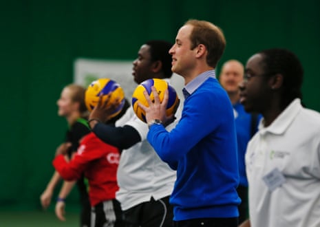 Prince William, the Duke of Cambridge plays volleyball with children during a Coach Core apprentice training program session at Westway Sports Centre, in London, UK.