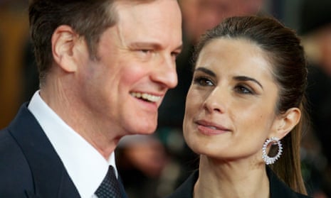 Colin Firth receives a loving look from his wife, Livia Giuggioli as they pose for pictures on the red carpet during the UK premiere of the film The Railway Man.