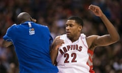 Toronto Raptors forward Rudy Gay, right, celebrates with Quincy Acy during the second half of an NBA basketball game against the Los Angeles Clippers in Toronto on Friday, Feb. 1, 2013. (AP Photo/The Canadian Press, Nathan Denette) color;colour;sports;play;court;competitive;competition;compete;athletics;athletic;athlete;action;NBA;basketball;Toronto;Canada;Canadian;Raptors;sport;playing;2013