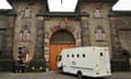 A 'sweat box' arrives at Wandsworth prison one of the jails where Chris Huhne may begin his sentence