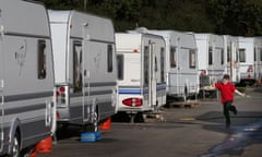 Travellers' caravans line a road near Dale Farm in Essex