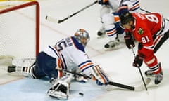 Chicago Blackhawks' Marian Hossa vs Edmonton Oilers' Nikolai Khabibulin