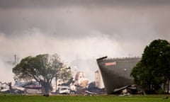 The remains of the the West Fertilizer Co plant in West, Texas smolder in the rain.