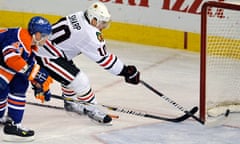 Blackhawks' Sharp scores against Oilers' Potter during their NHL hockey game in Edmonton