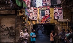 Supporters of the PTI party mingle in the street