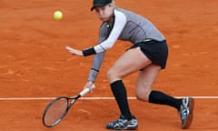 Bethanie Mattek-Sands of the US hits a return to Li Na of China at the French Open