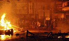 A mosque burns during May's rioting in Lashio.