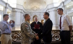 Army captain Michael Potoczniak marries Todd Saunders at San Francisco's City Hall.