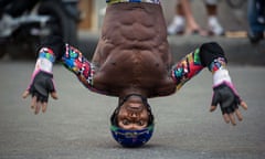 Male standing on his head