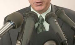 man speaking into microphone