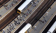 A view of trains and passengers at London Bridge station in London from the 69th floor of the Shard