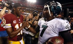 Washington Redskins quarterback Robert Griffin III (L) and Philadelphia Eagles quarterback Michael Vick