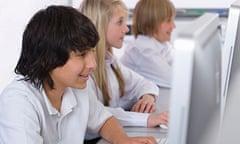 Students working on computers in school computer lab