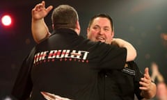 Alan Norris, the losing finalist, right, congratulates Stephen Bunting after Bunting won the final