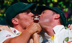 Peter Siddle and Michael Clarke with the replica Ashes urn.