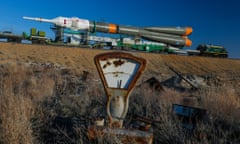 A rocket carrier with the 'Soyuz TMA-08M' spacecraft is moved to a launch pad behind an old weighing machine at the Baikonur cosmodrome in Kazakhstan, in March 2013.