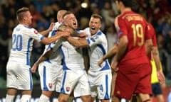 Juraj Kucka (C) of Slovakia celebrates his goal against Spain.